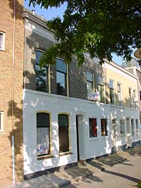herenhuis en winkelwoning te koop in Zwijndrecht - huis - pand - winkel en woning - aan/bij het water - rivier de Maas