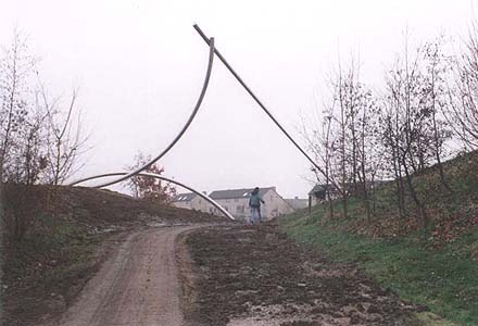 Homage to El Lissitzky - land art project with red steel element.
