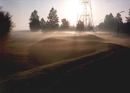 Homage to El Lissitzky - land art project with red steel element.
